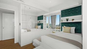 Apartment, 3 Bedrooms, City View | Desk, laptop workspace, iron/ironing board, free WiFi
