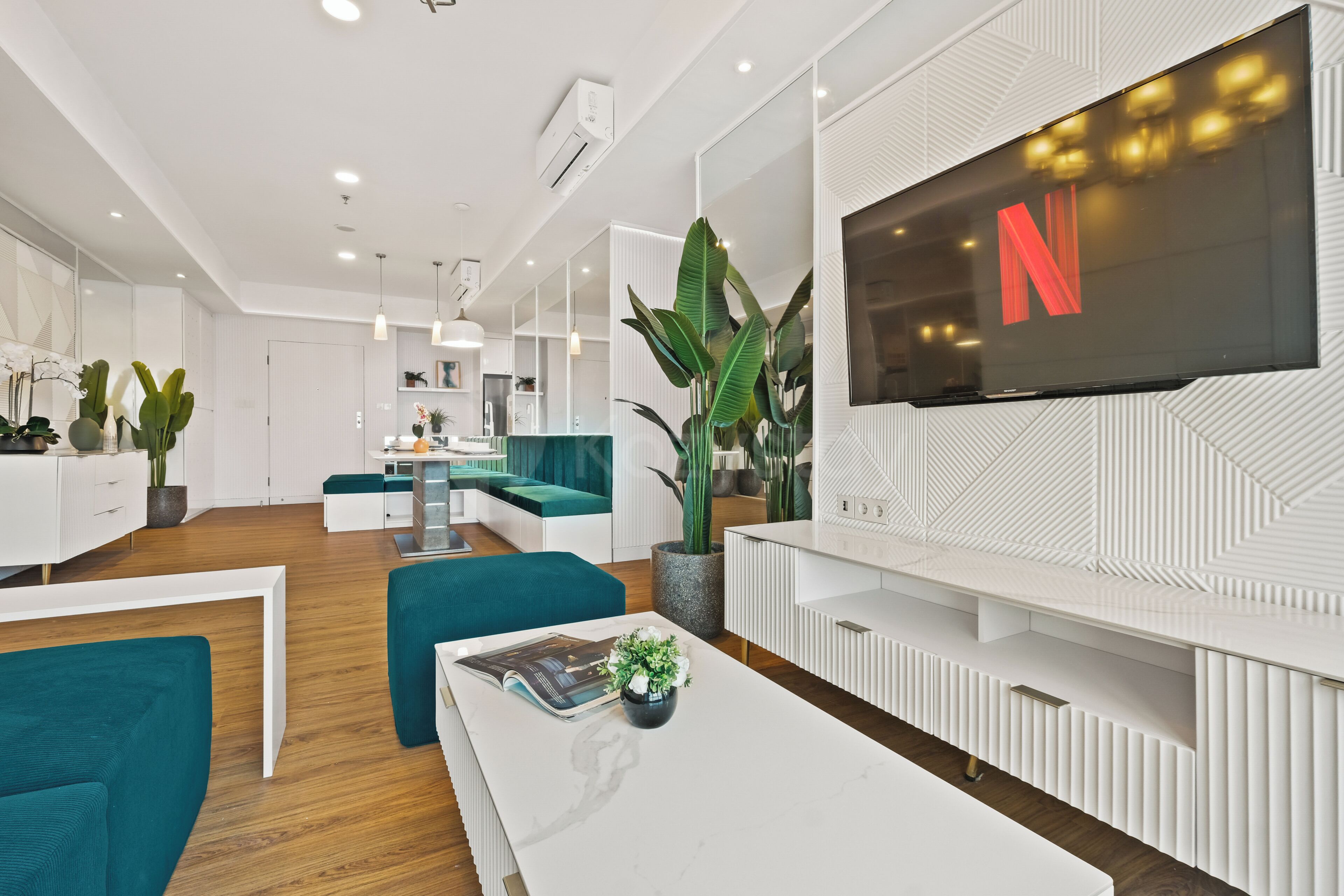 Apartment, 3 Bedrooms, City View | Living room | 50-inch Smart TV with cable channels, Netflix, streaming services