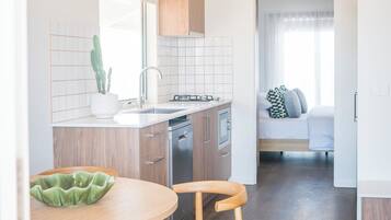 Deluxe Villa, 1 King Bed, Resort View | Private kitchen | Full-sized fridge, microwave, oven, stovetop