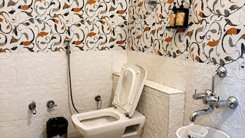 Shower, towels, soap, shampoo