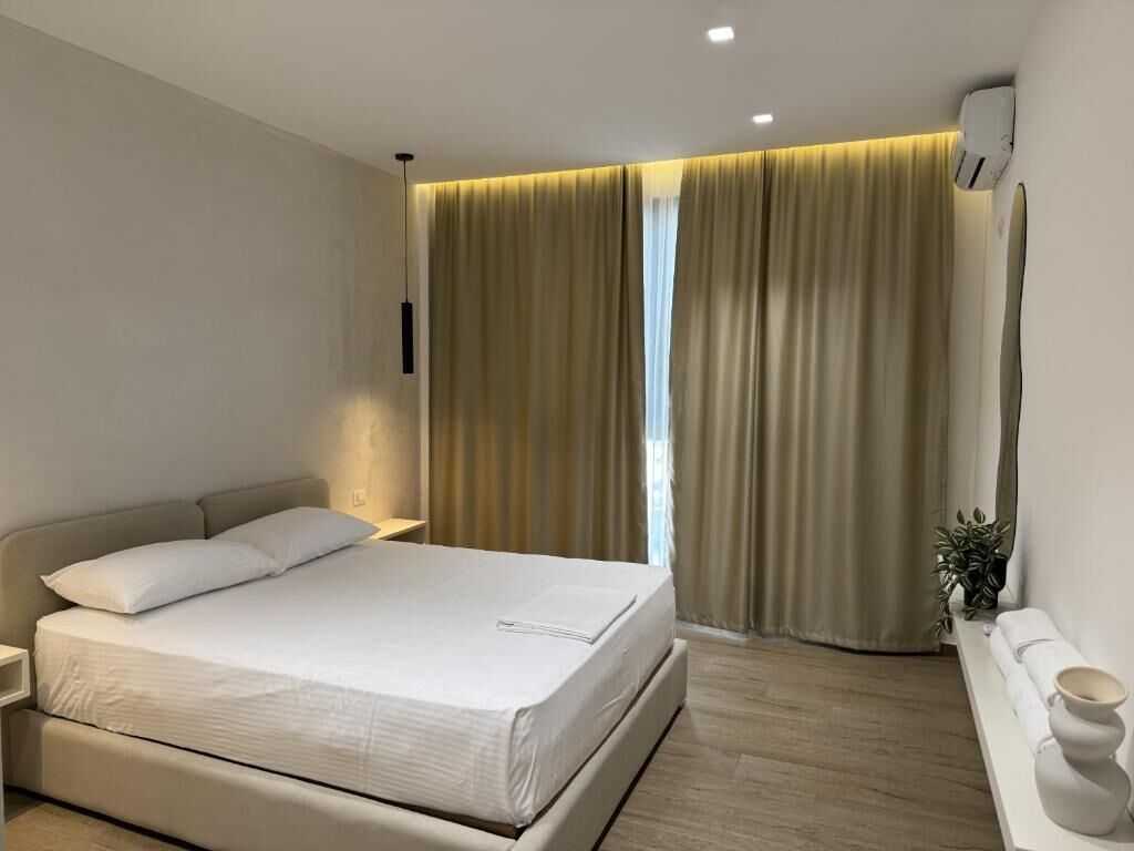 Cofres nos quartos, ferros/tábuas de passar roupa, Wi-Fi de cortesia