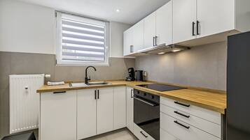 Refrigerador, horno, placa de cocina, lavavajillas