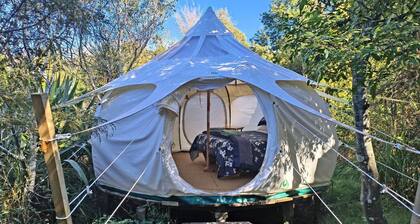 Secluded Island Glamping Retreat with Outdoor Kitchen and Private Bathroom near Oneroa, Waiheke Island