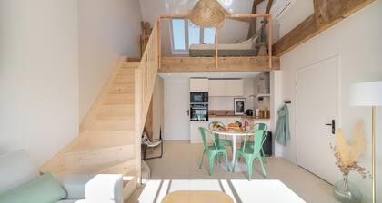 Two new, adjoining lofts in a former cannery: terraces and parking.