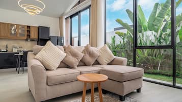 Exclusive Villa, 2 Bedrooms, Sauna, Garden View | Living area | 50-inch Smart TV with digital channels