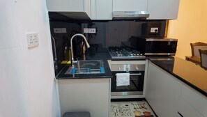 Apartamento Deluxe | Cocina privada