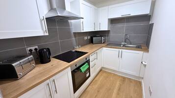 Fridge, microwave, stovetop, electric kettle