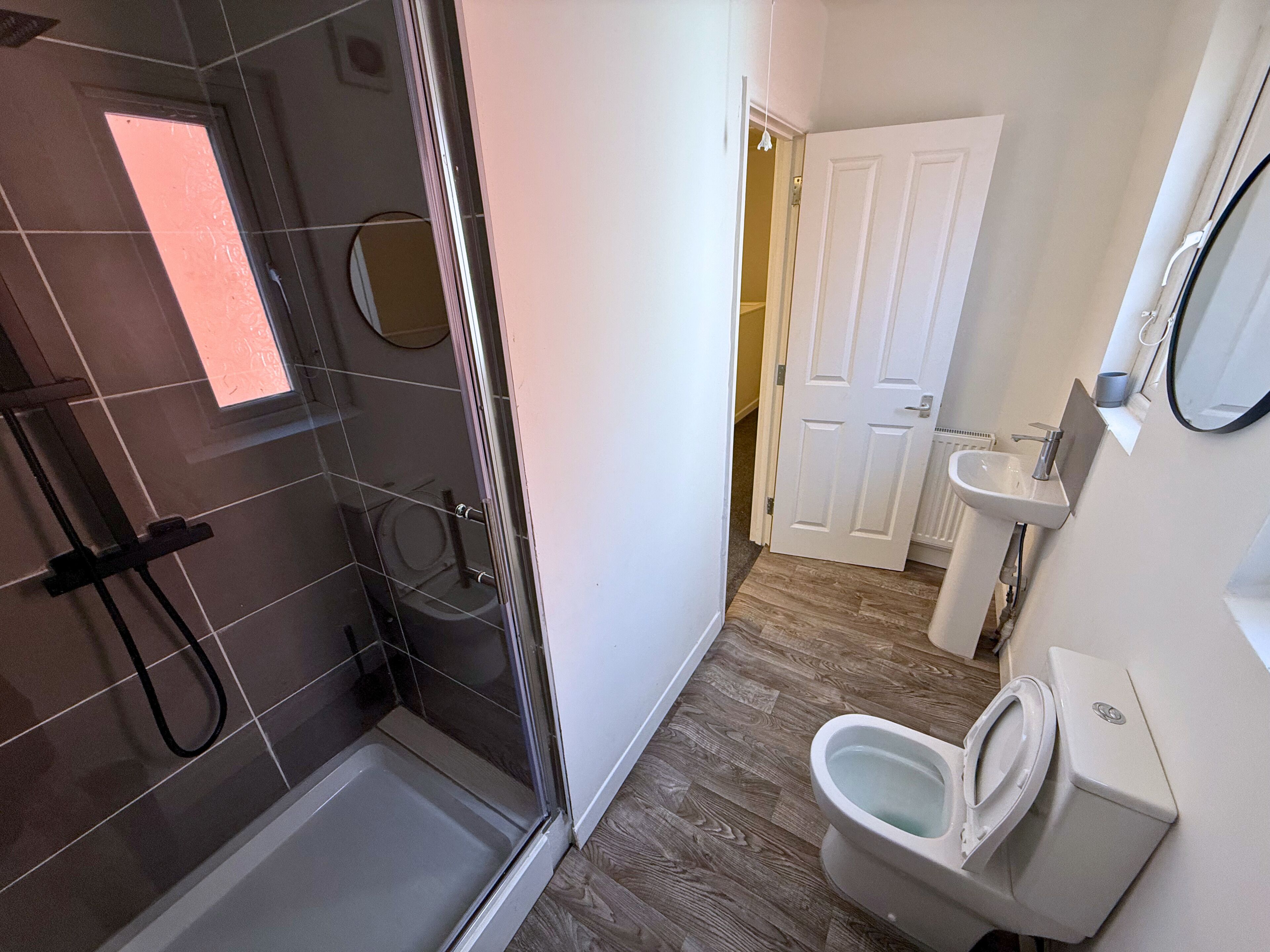 Shower, towels, toilet paper