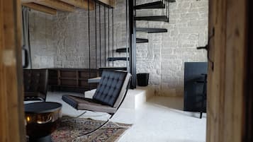 Suite – executive, 1 kingsize-seng, hageutsikt | Oppholdsområde