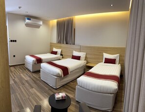 Triple Room, City View | Blackout drapes, soundproofing, iron/ironing board, free WiFi - hotel roh almadena (Madinah)