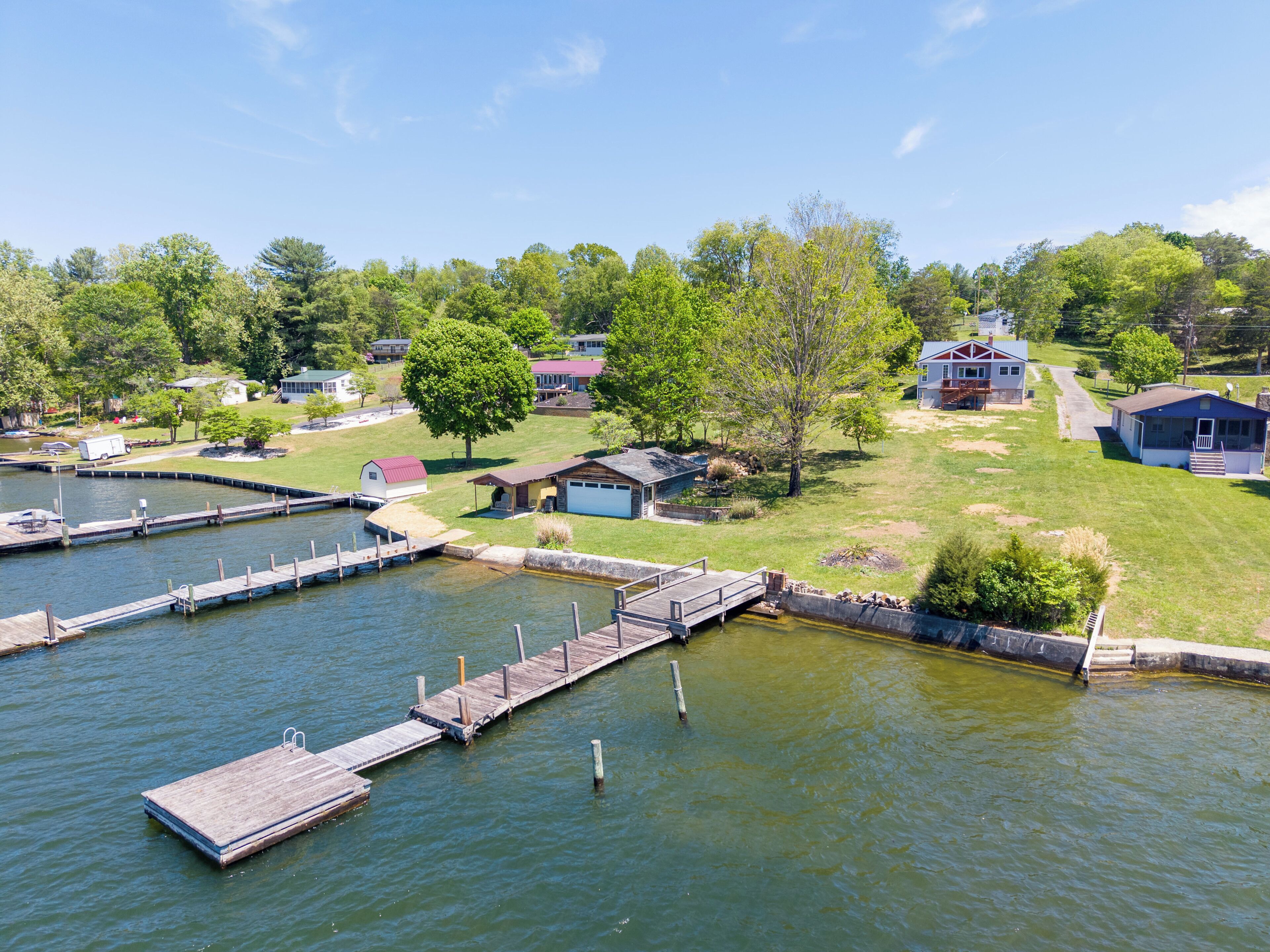Lakefront property view with dock access.