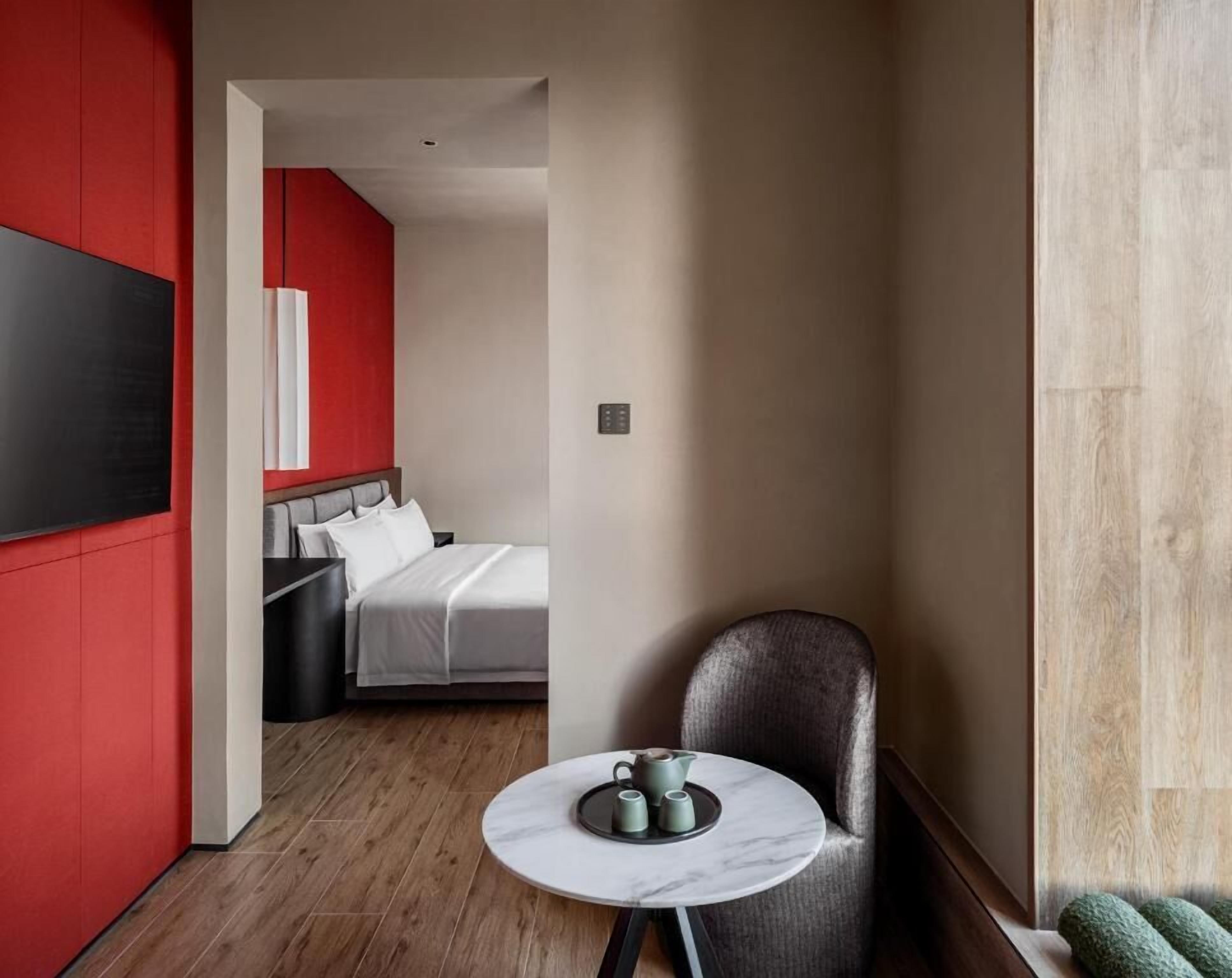 Deluxe Double Room, City View | Free minibar, blackout curtains, soundproofing, iron/ironing board