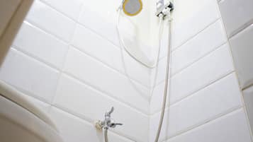 Standard Family Room | Bathroom | Shower, rainfall showerhead, towels, soap