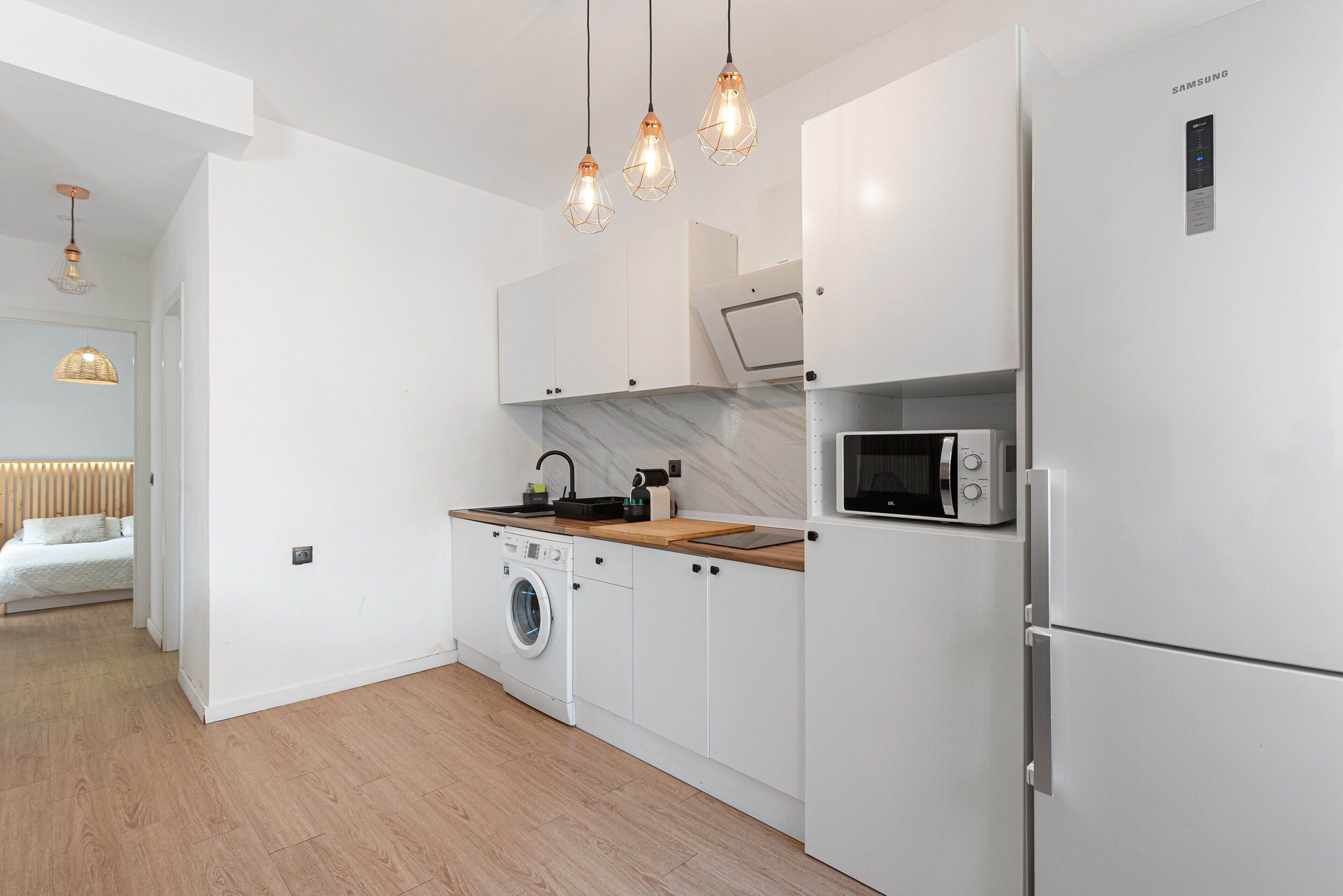 Fridge, microwave, stovetop, coffee/tea maker