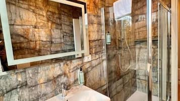 Hair dryer, towels, soap, shampoo