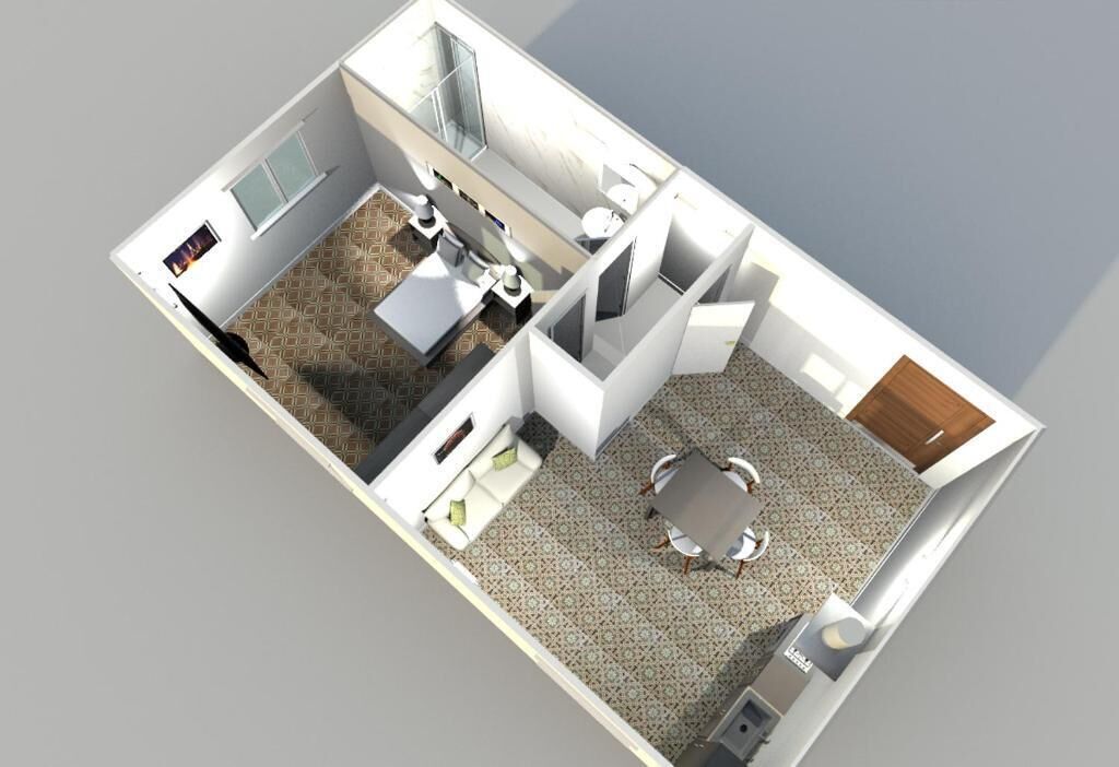 A 3D floor plan of a hotel room with a bathroom, a dining area, and a small kitchen.