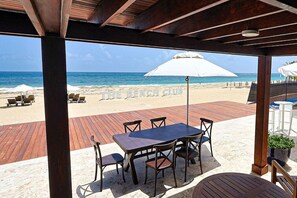 Outdoor dining - Spectacular Cana Rock Star Apartment, BBQ Balcony, Steps to Infinity Pool. (Punta Cana)
