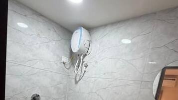 Double Room, City View | Bathroom | Free toiletries, slippers, towels, soap