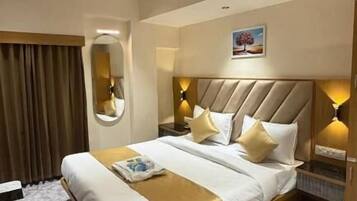 Double Room, City View | Desk, laptop workspace, iron/ironing board, free WiFi
