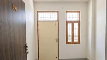 Desk, laptop workspace, free WiFi, bed sheets