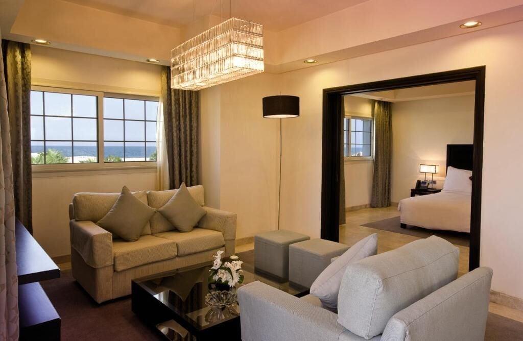 Superior Villa, Balcony, Beach View | Living area | 55-inch Smart TV with satellite channels