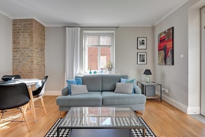 Apartamento Deluxe, vistas al jardín | Zona de estar
