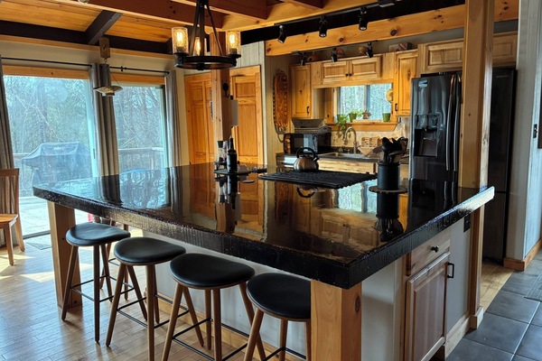 fully stocked kitchen with large pantry and gas range