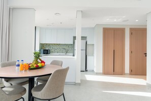 Deluxe Apartment, Balcony, City View | Dining - Samaya Holiday Homes - Neva Residences  (Dubai)