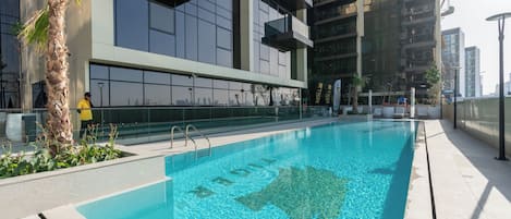 Deluxe Apartment, Balcony, City View | Pool | Outdoor pool, sun loungers