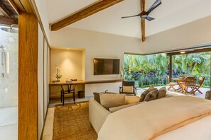 A bedroom with a bed, a desk, a chair, and a TV. - 3 Bed 3 Bath Villa With Pool (Punta de Mita)