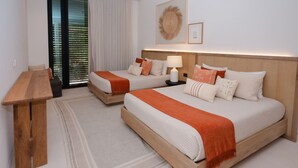 A hotel room with two beds, a wooden desk, a lamp, and a large window with blinds. - Naya 5102 Tower V in Punta de Mita (Punta de Mita)