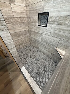 Shower, towels, toilet paper