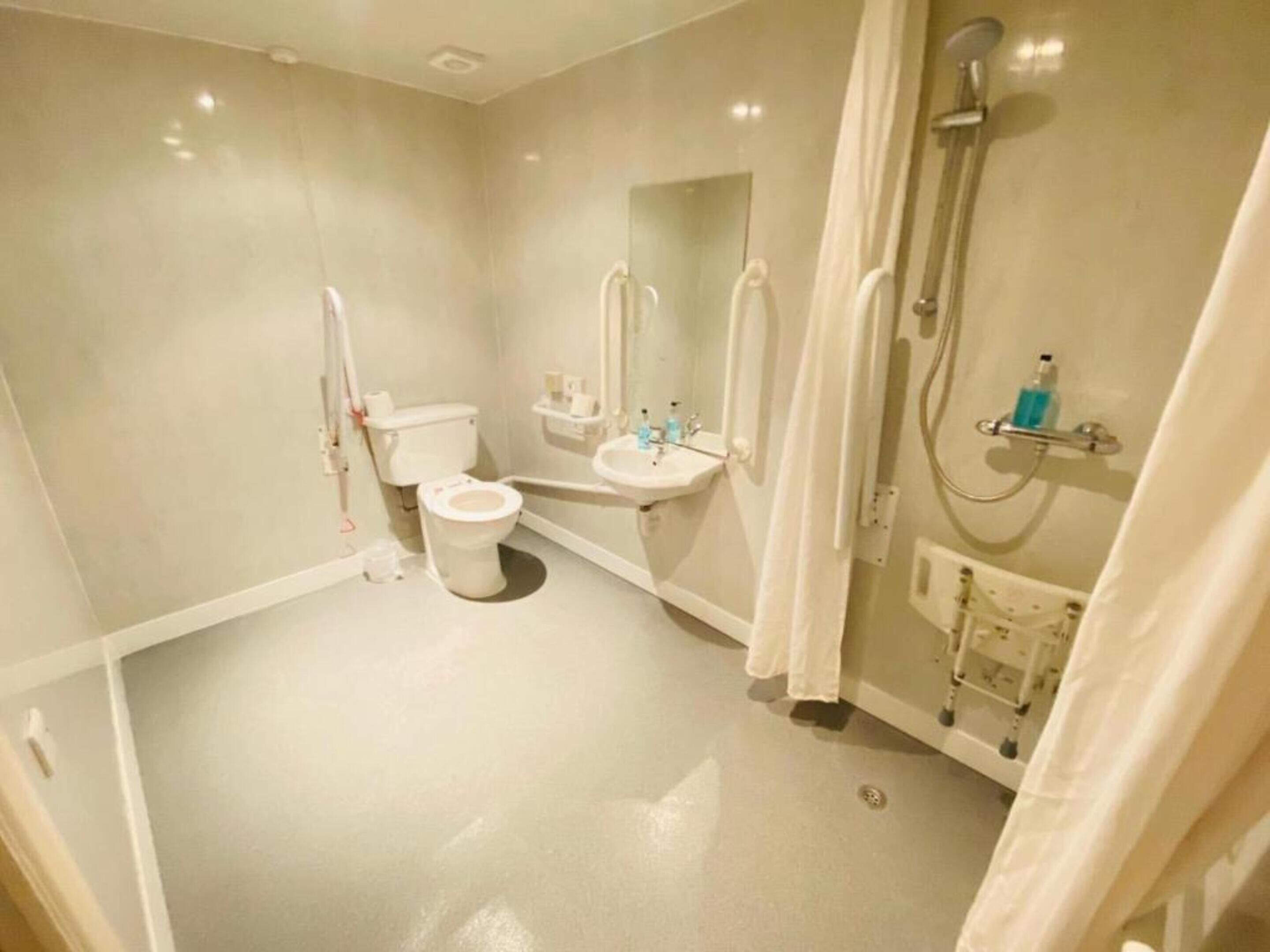 Shower, towels, toilet paper