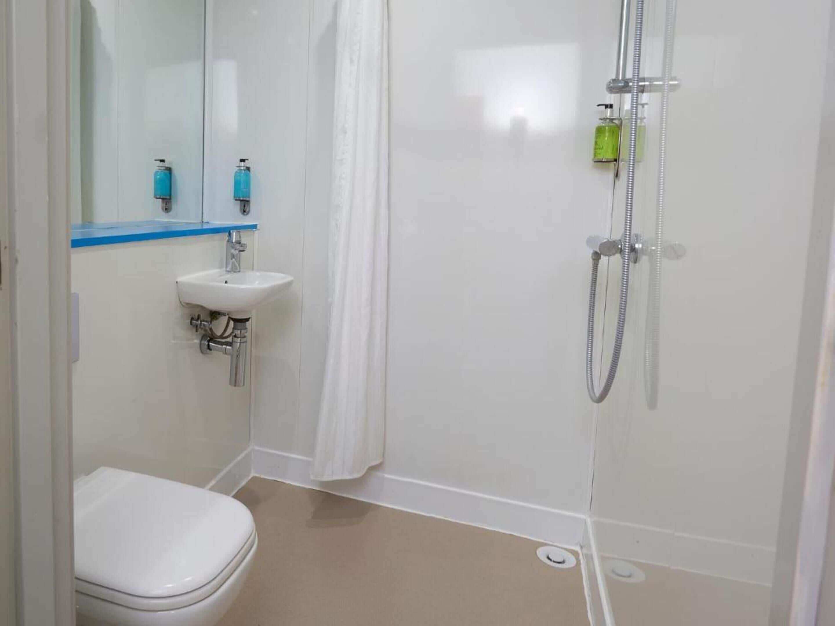 Shower, towels, toilet paper