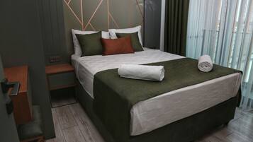 Family Apartment, Balcony, Pool View | In-room safe, laptop workspace, blackout drapes, free WiFi