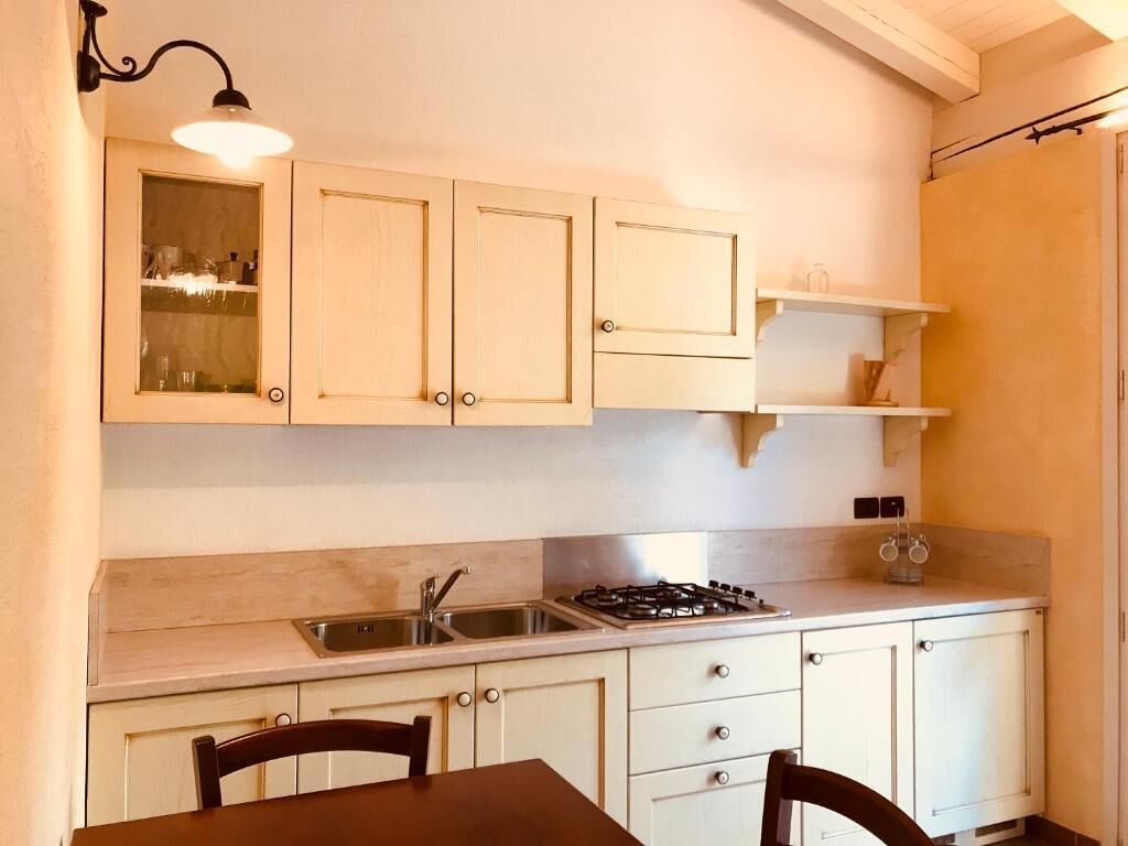 Apartamento clásico, vistas al jardín | Cocina privada | Trona infantil