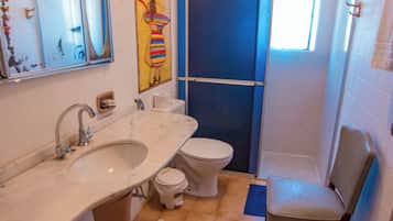 Shower, towels, soap, toilet paper