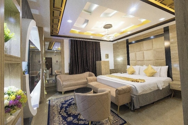 Economy Room, Balcony, City View | Desk, laptop workspace, blackout drapes, soundproofing