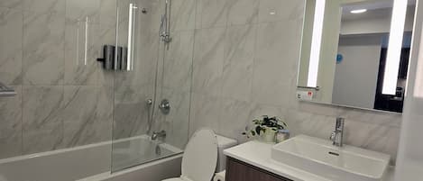 Hair dryer, towels, soap, shampoo