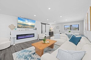 Smart TV, fireplace - Ocean Cove Luxury Beach Home | Pool & Spa | Walk to Vanderbilt Beach (Naples)