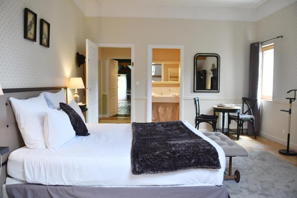 Chambre Triple Deluxe, vue jardin | Fer et planche à repasser, Wi-Fi gratuit