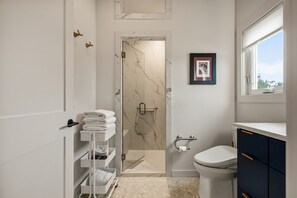 Shower, towels, soap, shampoo