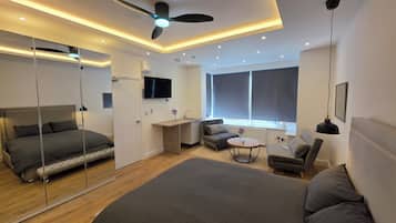 Deluxe Studio Suite, City View | Soundproofing, iron/ironing board, free WiFi