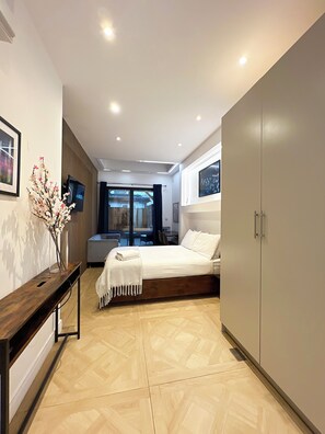 Suite | Individually decorated, individually furnished, desk, laptop workspace