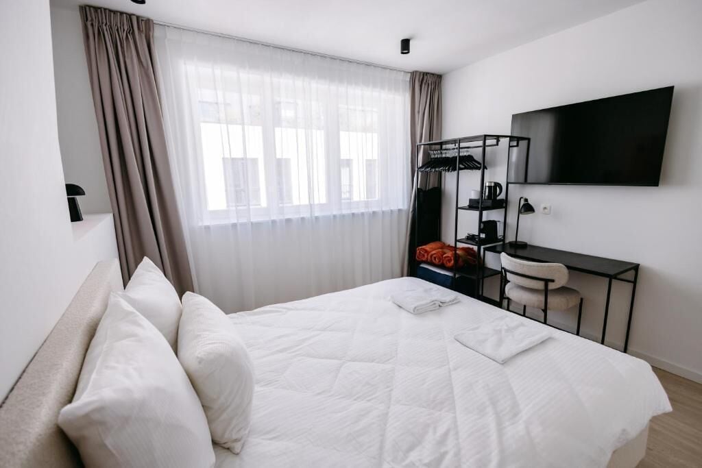 Chambre Deluxe, vue ville | Literie de qualité supérieure, surmatelas, ameublement personnalisé