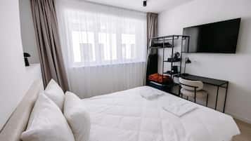 Chambre Deluxe, vue ville | Literie de qualité supérieure, surmatelas, ameublement personnalisé