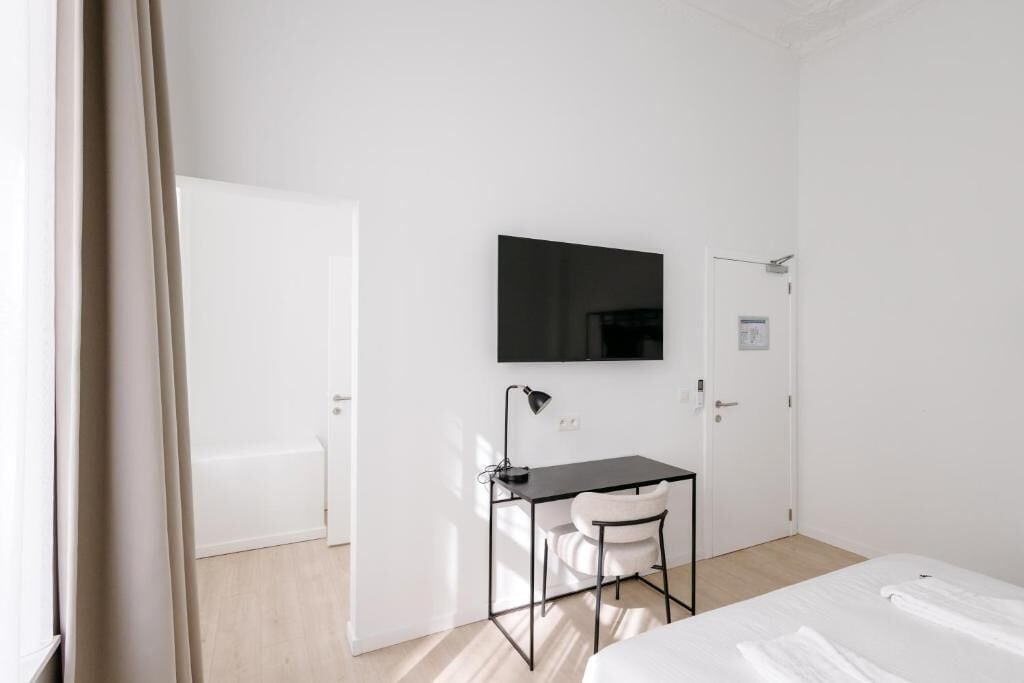 Double Room, City View | Premium bedding, pillowtop beds, individually furnished, desk