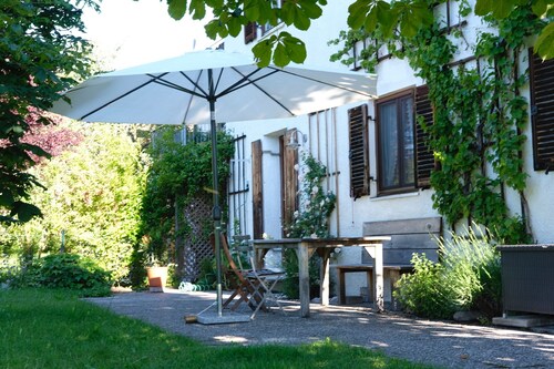 Ruhige, gepflegte ****Ferienwohnung, EG mit Terrasse & Garten, zentral in Murnau