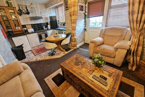 TV, fireplace - Characterful top-floor flat · Fireplace · Steps from Pleasure Beach (Blackpool)