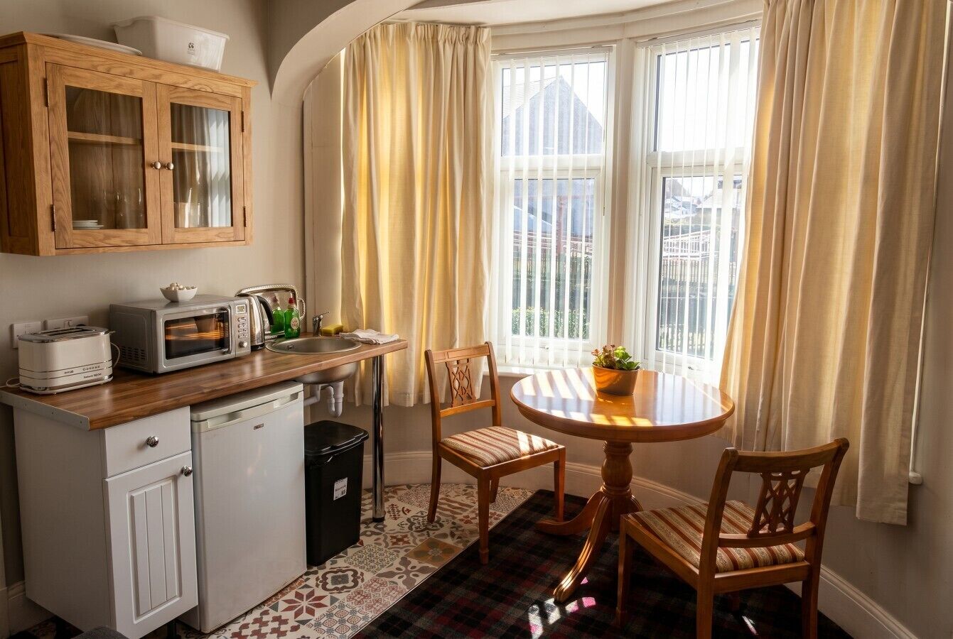 Fridge, microwave, toaster, cookware/dishes/utensils